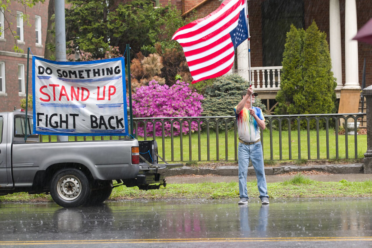 Academy Green Protestors Defy Downpour